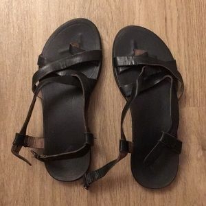 Lightly worn leather sandals